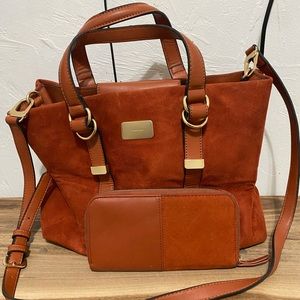 Orange bag with wallet.